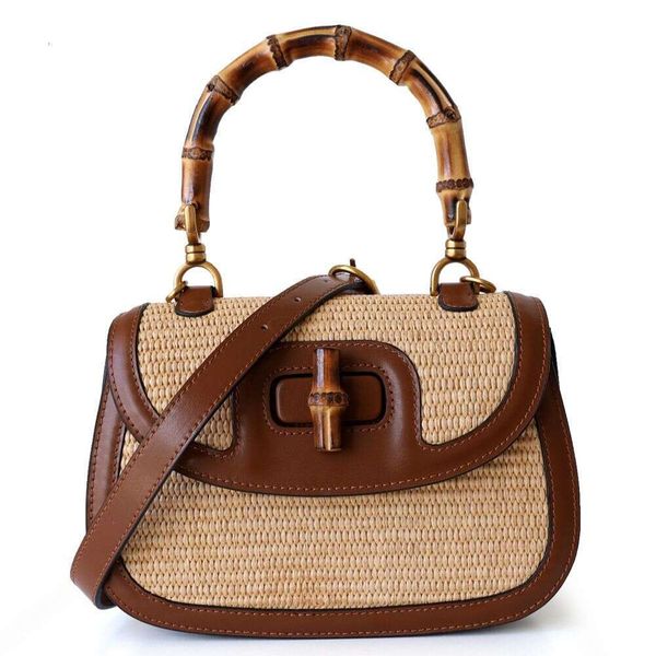 2025 genuine leather splicing grass woven shoulder crossbody bag casual bamboo section fashionable women's bag bamboo handle bags