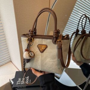Designer free shipping 2025 new women's fashion commuting high-end hand-held bucket shoulder crossbody bag