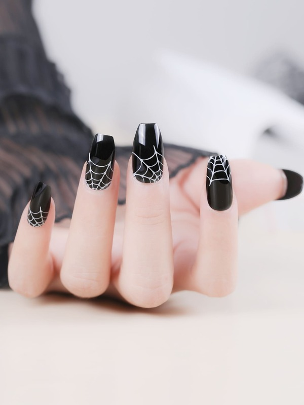 Halloween Themed 28pcs short coffin nails with black and white cobweb design UV /glossy finish , reusable full cover nails in 10 Sizes - Nail Kit with