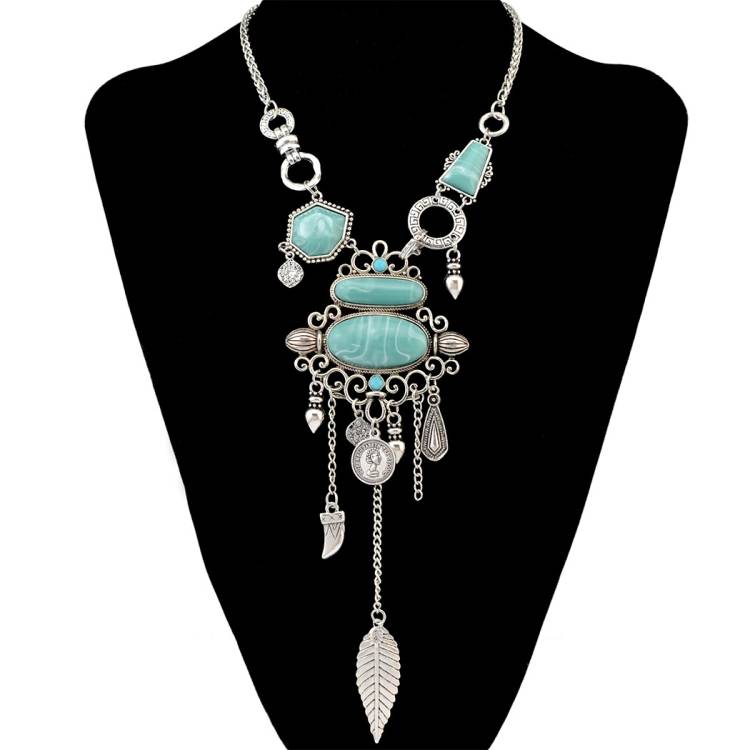 Exaggerated hollow patterned turquoise alloy gemstone necklace